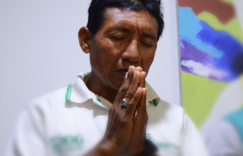 praying Wayuu pastor Charito