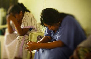 Wayuu ladies praying at local church
