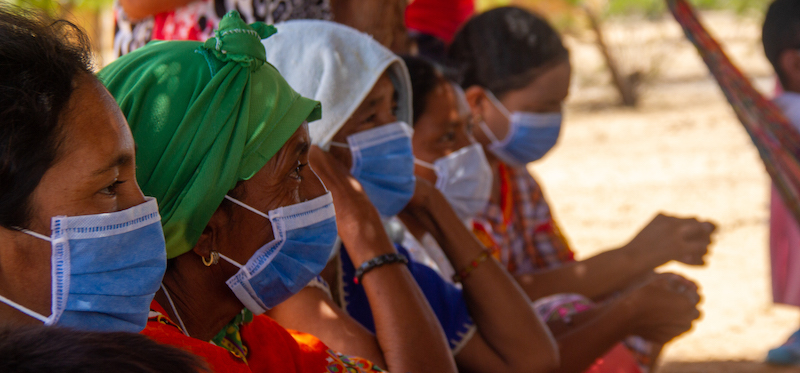 Wayuu people wearing protective medical masks