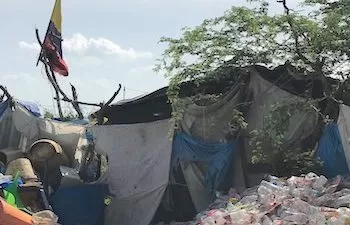 a shelter built in a landfill